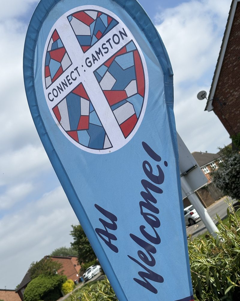 The Connect Gamston All Welcome flag outside the school